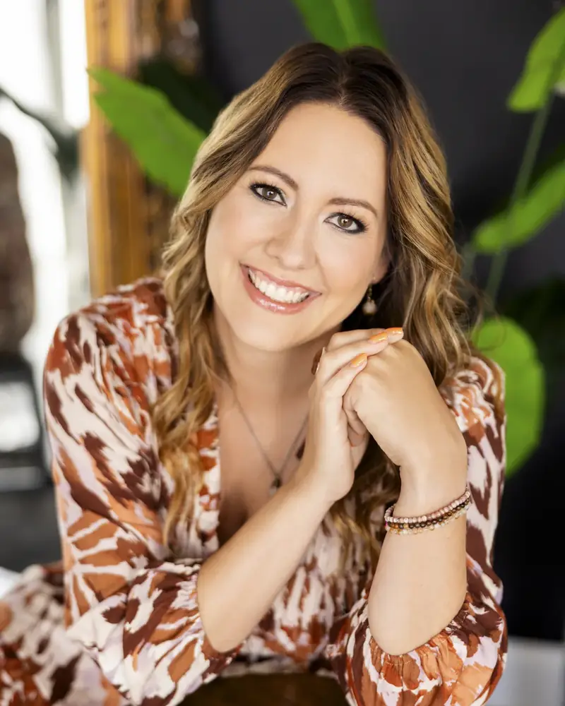 Kelly Pasztor, Human Design coach and founder of Dreamcatcher Wellness, smiling warmly